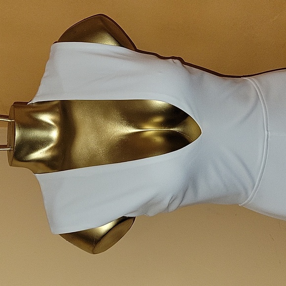 LULU'S THINKING OUT LOUD WHITE CUT-OUT JUMPSUIT. SIZE SMALL. - Picture 8 of 11